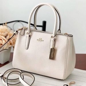 Coach, hand and crossbody bag